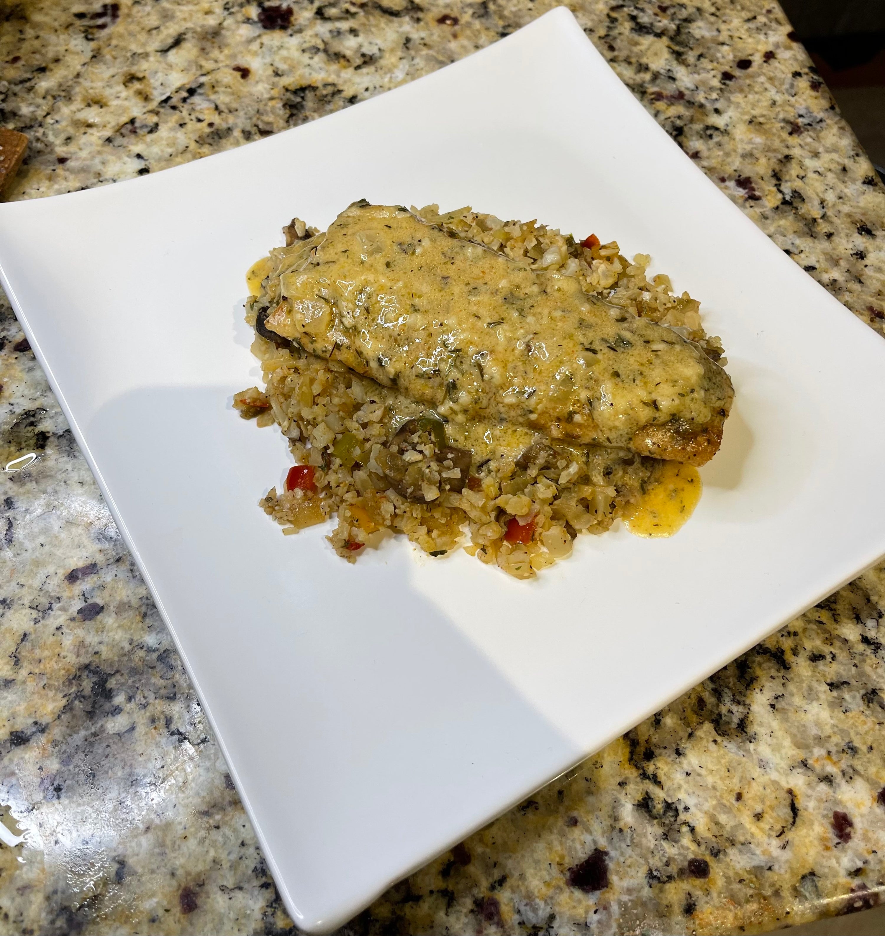 Mahi Mahi in Lemon Garlic Cream Sauce over Mushroom Cauliflower Rice with Peppers